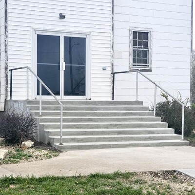 Completed staircase making it safer for visitors to enter our building