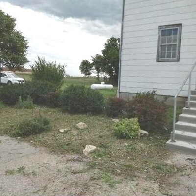 North front lawn after the cleanup - notice propane was painted too!